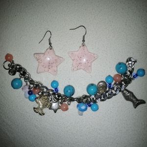 Pink and blue charm bracelet with star earrings